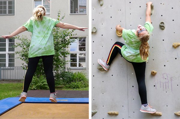 Mädchen auf Trampolin und Kletterwand