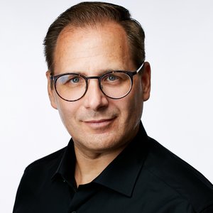 Portaitfoto von Dirk Hein, Geschäftsführer Sana HR Solutions GmbH.