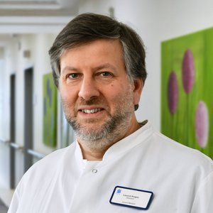 Portraitfoto von Leonid Kogan, Facharzt für Innere Medizin mit Zusatzqualifikationen Palliativmedizin, Geriatrie und Ernährungsmedizin